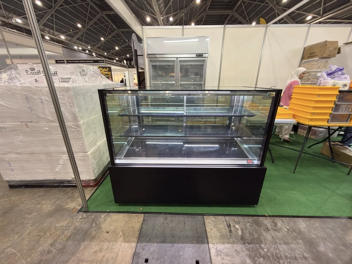 AANRS cake chiller rental Singapore, KINCO Three-Layer Cake Display Chiller P150L3-B-C (White LED / 150cm / Black Finishing), in use at a real Singapore event