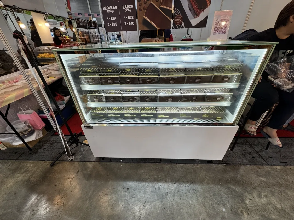 AANRS cake chiller rental Singapore, Kojima Three-Layer Cake Display Chiller B150L3-W-C (White LED / 150cm / White Finishing), in use at a real Singapore event